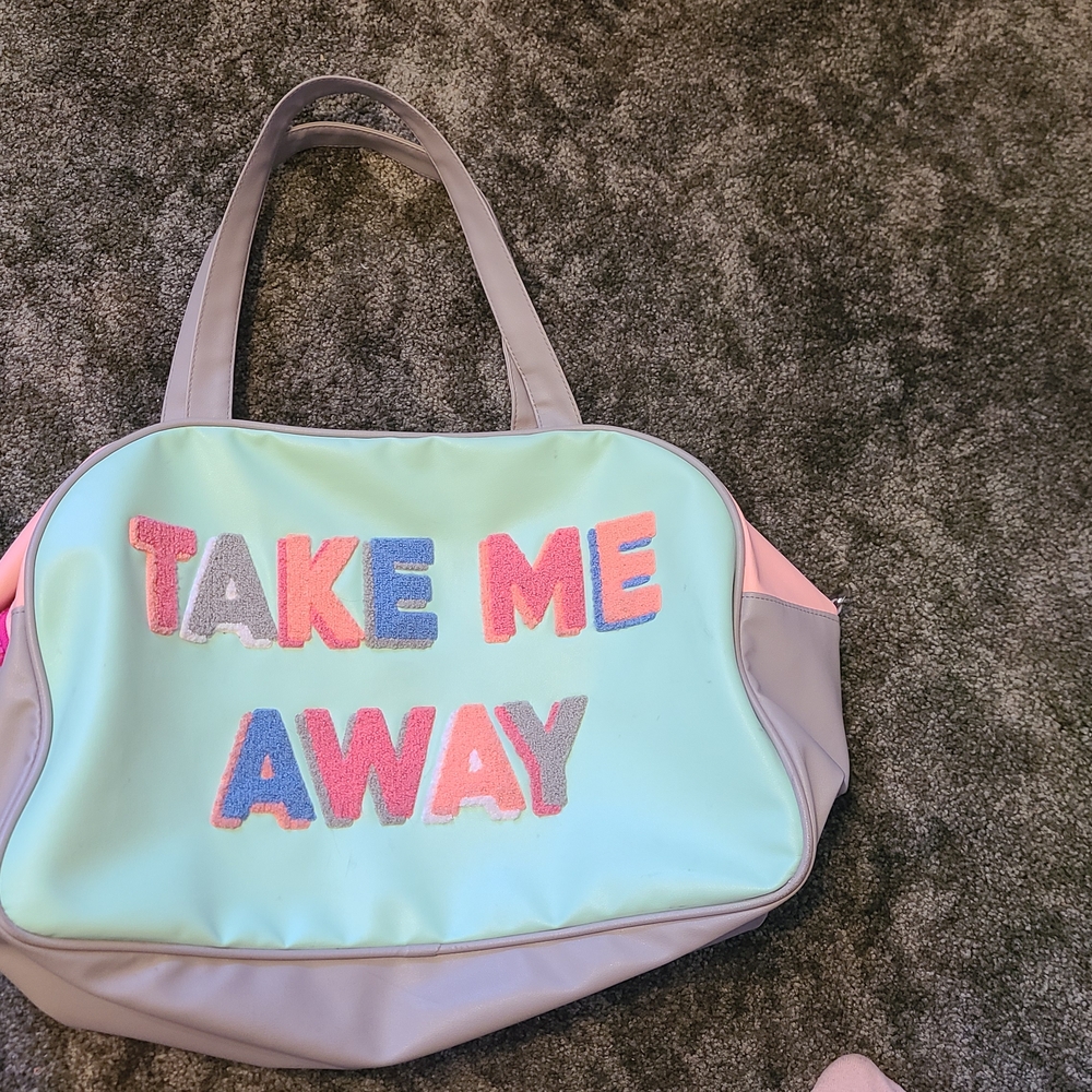 Jadelynn Brooke Green and Pink Travel Bag with Playful Design